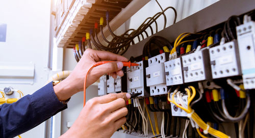 Close-up of man working at construction site