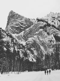 Scenic view of snow covered mountains