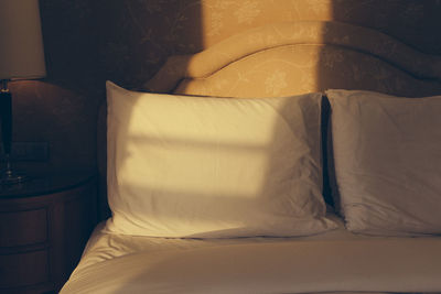 Close-up of sofa on bed at home