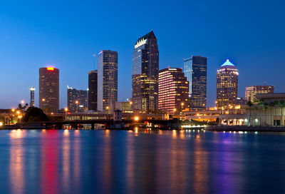 Evening skyline of downtown tampa, fl looking across the water with light reflecting in the ripples