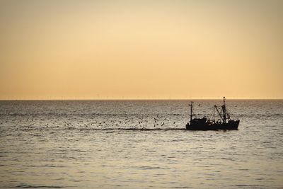 Scenic view of sea at sunset