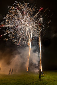 Firework display at night