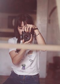 Man photographing with camera