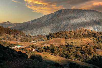 Scenic view of mountains against sky during sunset