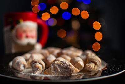 Christmas dinner dessert with bokeh lights background