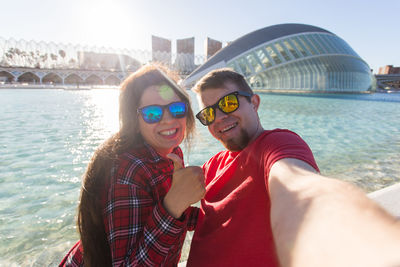 Low angle view of young woman in boat