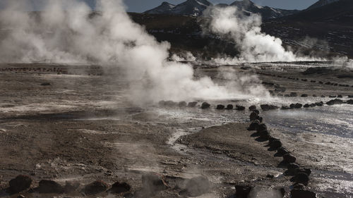 Smoke emitting from volcanic land