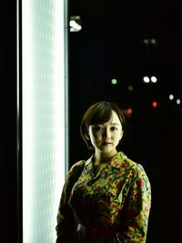 Portrait of young woman looking away