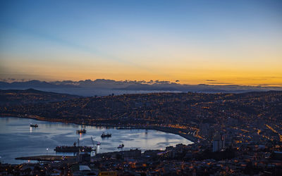 Sunset over the bay and town of valparaiso in chile