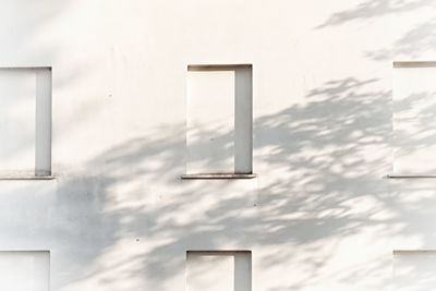 Full frame shot of building wall during sunny day