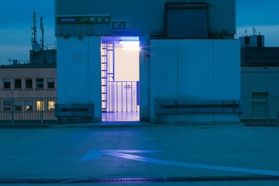 Illuminated building terrace at night