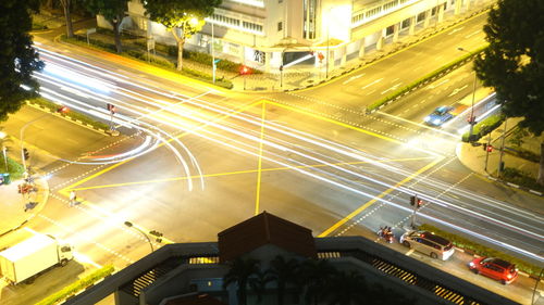 High angle view of light trails on road in city