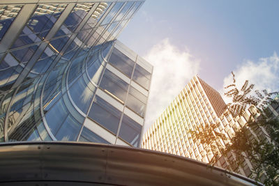 Low angle view of modern buildings against sky