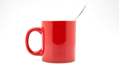Close-up of coffee cup against white background