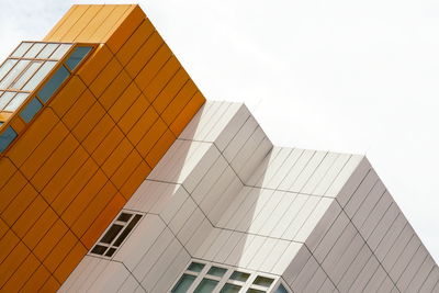 Low angle view of modern building against clear sky