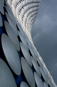 Low angle view of feather against sky