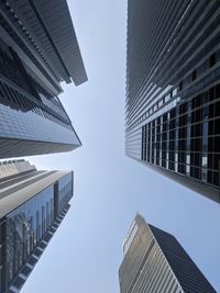 Low angle view of modern buildings against clear sky