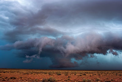 Storm clouds over landscape 