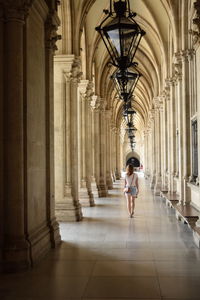 Woman walking in corridor