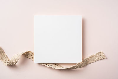 High angle view of coffee on table against white background