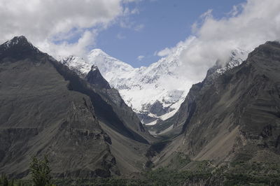 Scenic view of snowcapped mountains against sky