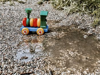 High angle view of toys on lake