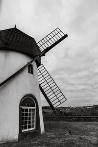 Low angle view of built structures against sky