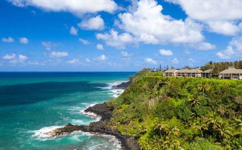 Aerial panoramic image off the coast over princeville and the kenomene ocean overlook on  kauai