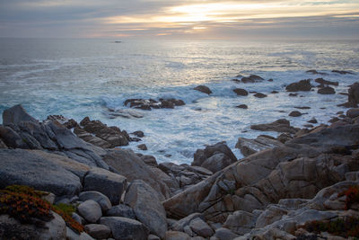 Scenic view of sea against sky during sunset