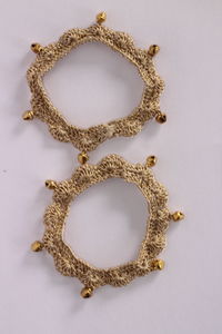 Close-up of necklace on table