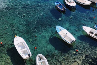 High angle view of boats moored in lake