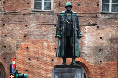 Low angle view of statue against building