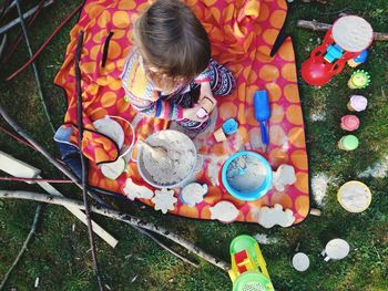 High angle view of girl playing outdoors