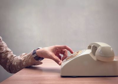 Midsection of person working on table