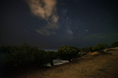 Scenic view of sea against sky at night