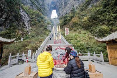 Rear view of people at temple