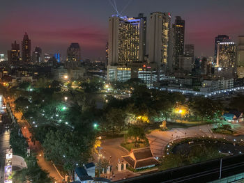 High angle view of illuminated buildings in city at night