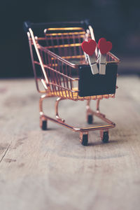 Close-up of red basket on table