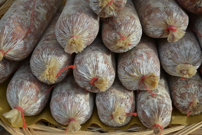 High angle view of salamis for sale at market stall