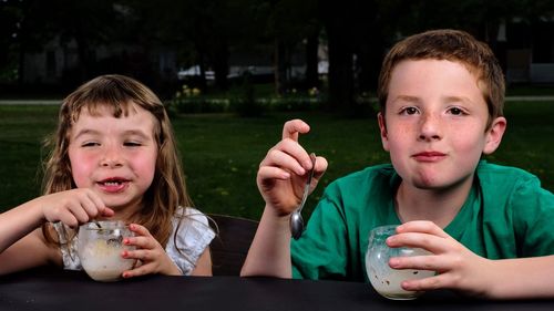 Portrait of a boy drinking water