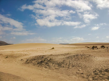 Scenic view of desert against sky