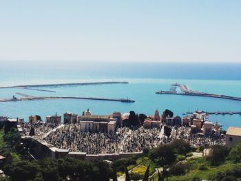 High angle view of bay against clear sky