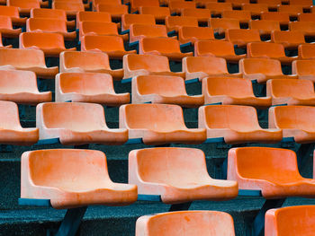 Full frame shot of empty chairs in stadium