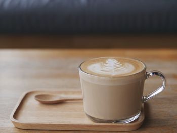 Close-up of cappuccino on table
