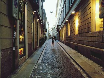 Man walking on street in city