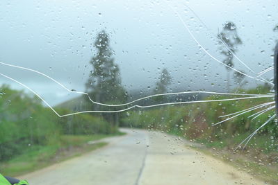 Wet glass window in rainy season