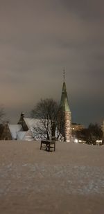 Traditional building against sky during winter