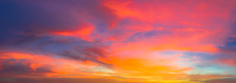 Low angle view of dramatic sky during sunset