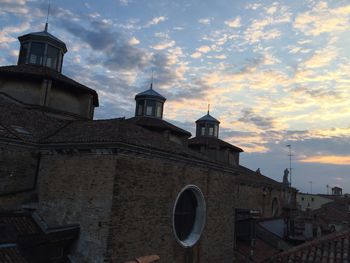 Low angle view of bell tower against sky