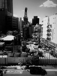 Buildings in city against sky